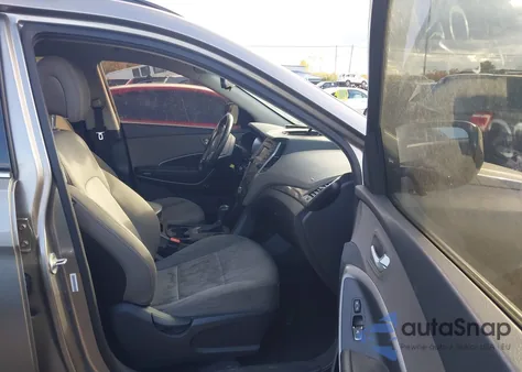 2015 Hyundai Santa Fe Sport 2.4L z USA, uszkodzony, nr VIN 5XYZUDLB9FG238562